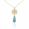 KPN 000283 Turquoise Colored Pendant with Laser Cut Filigree in Yellow Gold